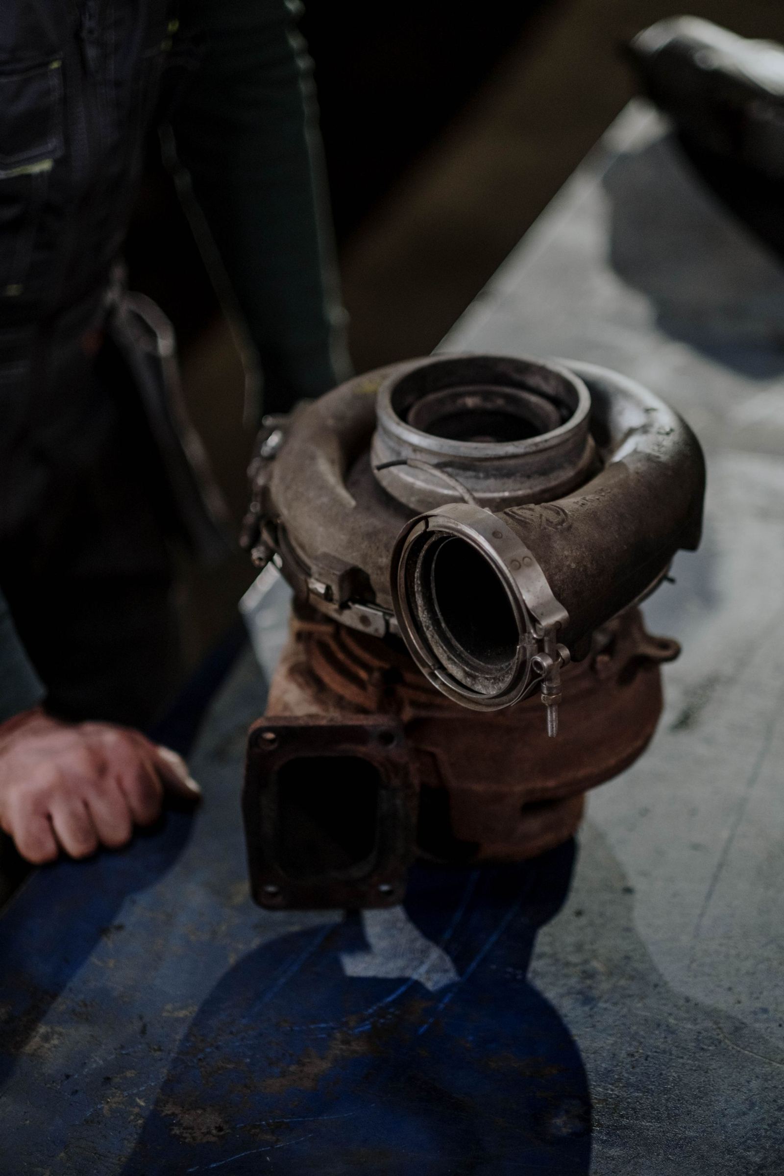 Used turbocharger held in hand