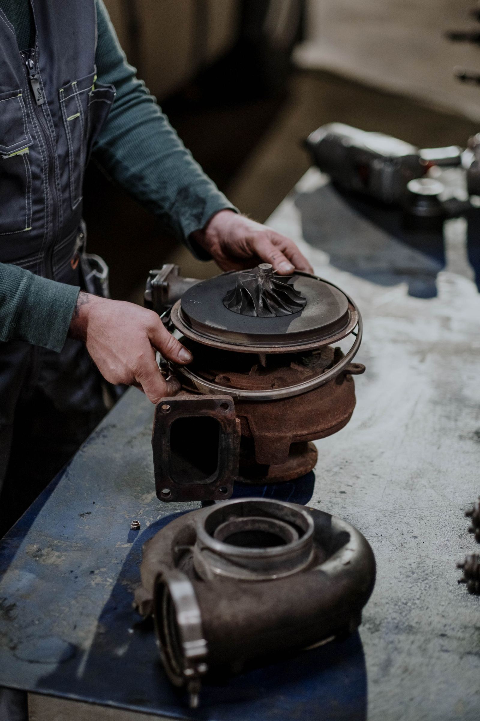 Inspecting a used turbocharger on the bench